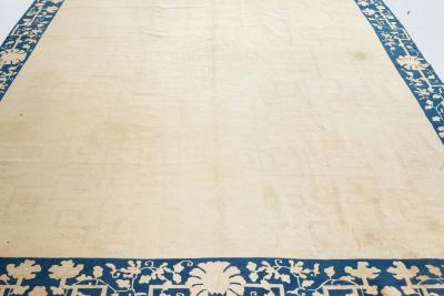 Early 20th Century Chinese Beige and Blue Handmade Wool Rug