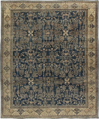 Early 20th Century Persian Kirman Navy Blue and Camel Wool Rug
