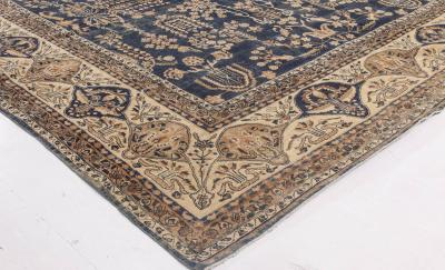 Early 20th Century Persian Kirman Navy Blue and Camel Wool Rug