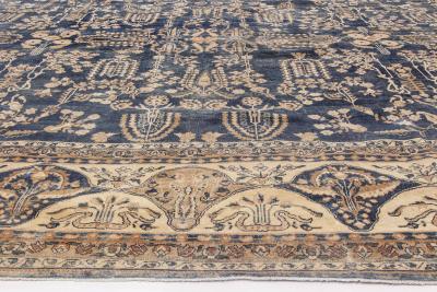 Early 20th Century Persian Kirman Navy Blue and Camel Wool Rug