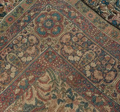Early 20th Century Persian Kirman Wool Rug in Blue Brown Green Pink and Red