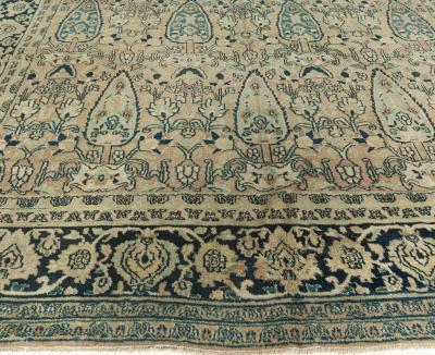 Early 20th Century Persian Meshad Warm Beige Background Hand Knotted Wool Rug