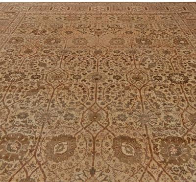 Early 20th Century Persian Tabriz Handwoven Wool Rug in Caramel Salmon Shades