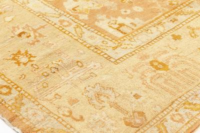 Early 20th Century Turkish Oushak Gold Green Orange and Pink Rug