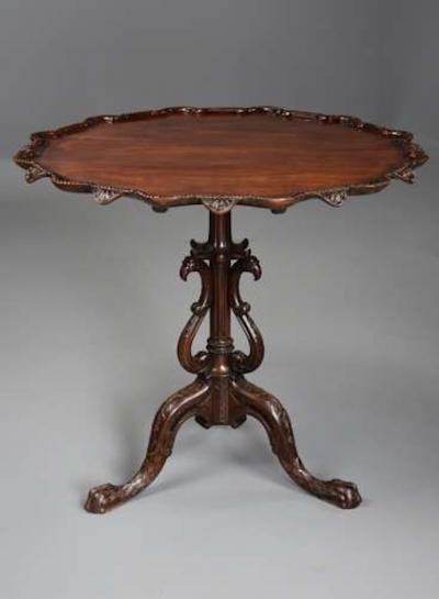Early 20thc mahogany tilt top tripod table in the Chippendale style