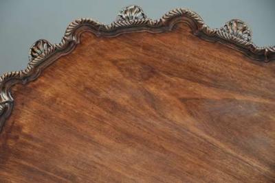 Early 20thc mahogany tilt top tripod table in the Chippendale style