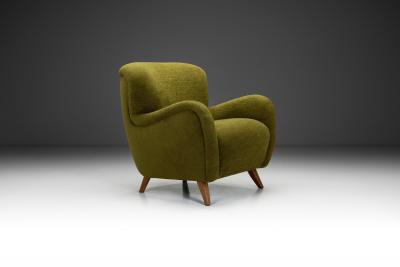 Easy Chair with Angled Beech Legs and Deep Green Upholstery Europe 1940s