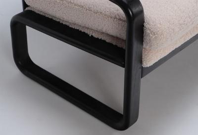 Ebonized French three seat sofa recently upholstered in Boucle fabric