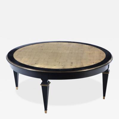 Ebonized round coffee table in the manner of Jansen circa 1940 