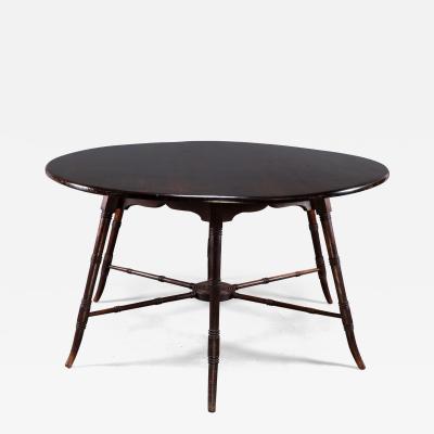 Edward William Godwin E W Godwin an Anglo Japanese Aesthetic Movement walnut centre or dining table