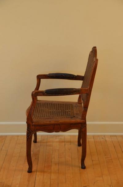 Elegant Caned Louis XV Period Walnut Armchair