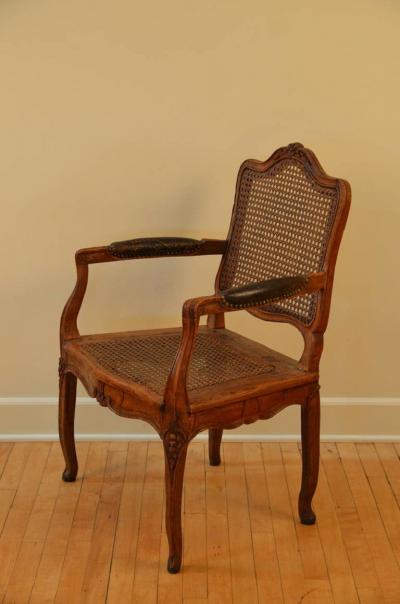 Elegant Caned Louis XV Period Walnut Armchair