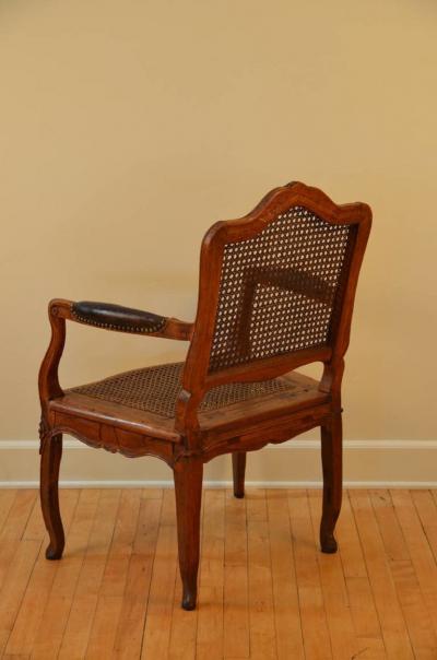 Elegant Caned Louis XV Period Walnut Armchair