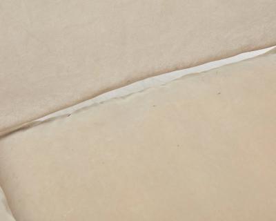 Elegant Caned Lounge Chair in the Style of Dunbar