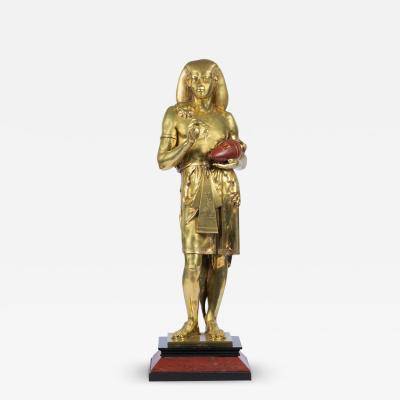 Emile Picault A FRENCH ANTIQUE GILT BRONZE FIGURE OF AN EGYPTIAN SCRIBE BY EMILE PICAULT