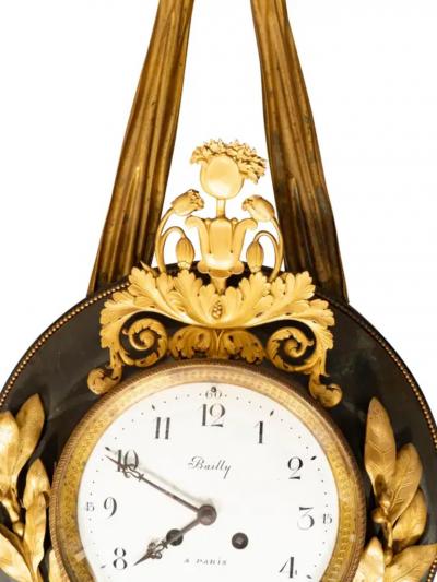 Empire Bronze and Ormolu Cartel Clock by Bailly Paris