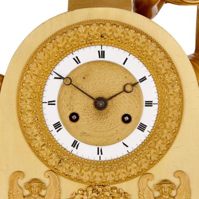 Empire period gilt bronze mantel clock