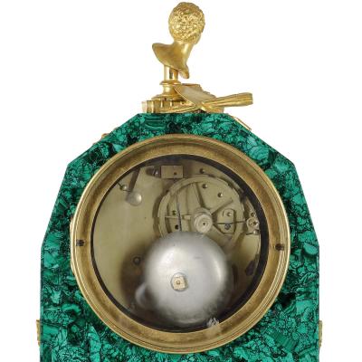 Empire period ormolu mounted malachite allegorical mantel clock