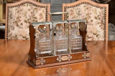 English 19th Century Victorian Locking Tantalus with Three Cut Glass Decanters