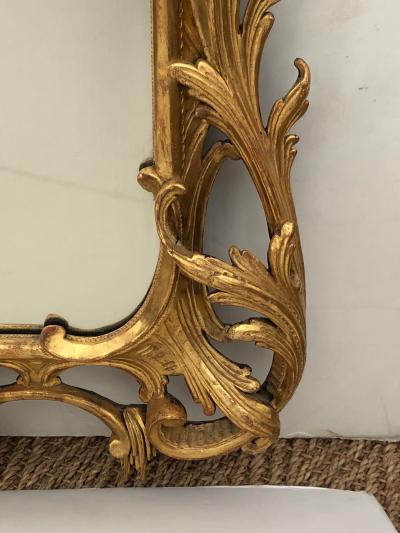 English Chippendaled Style carved giltwood mirror in the Chinese taste