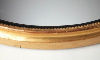 English George III Giltwood and Ebonized Frame Convex Mirror circa 1800