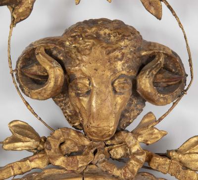 English George III Oval Hepplewhite Gilded Mirror with Rams Head Surmount