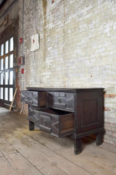 English Jacobean 17th Century Oak Four Drawer Commode of Rare Form