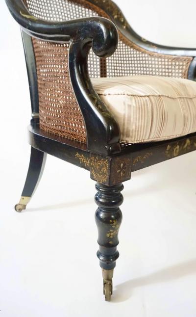 English Regency Faux Papier m ch Caned Bergere or Armchair circa 1830