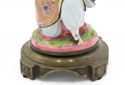 English Regency Ormolu and Porcelain Figural Candlestick