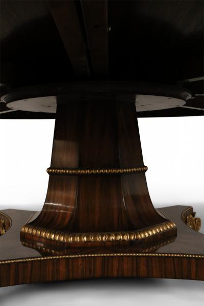 English Regency Style Rosewood and Giltwood Round Dining Table