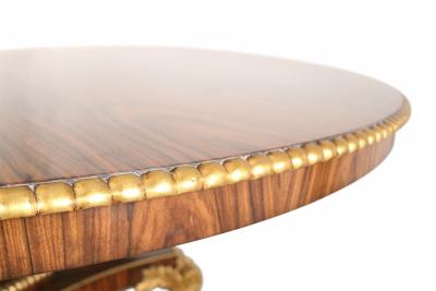 English Regency Style Rosewood and Giltwood Round Dining Table