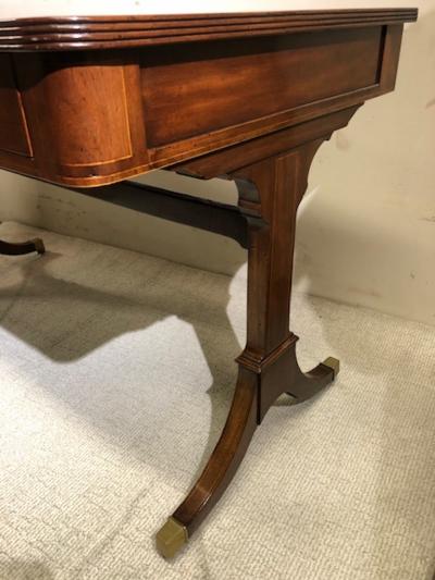 English Regency Trestle end leather to writing desk w ring handles