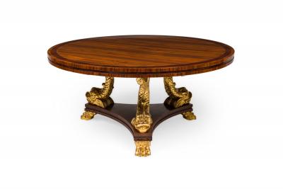 English Regency style rosewood center table with 3 gilt dolphins