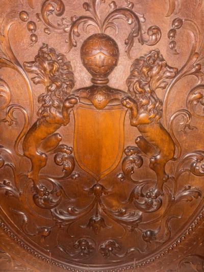 English Renaissance style square wall plaque with carved coat of arms