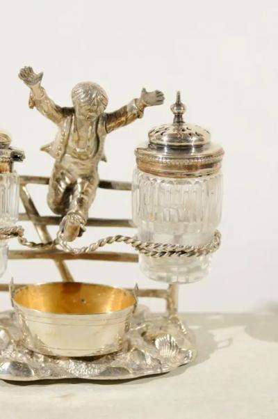 English Silver Plated Cruet Set of Young Boy Leaping in the Air circa 1873
