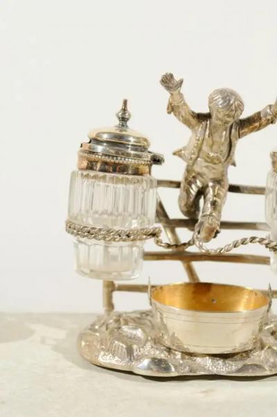 English Silver Plated Cruet Set of Young Boy Leaping in the Air circa 1873