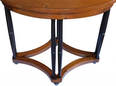 English pine oval center side table raised on columnar supports