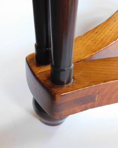 English pine oval center side table raised on columnar supports
