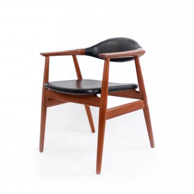 Erik Kirkegaard Set of 4 4 Black Vinyl and Teak Erik Kirkegaard Midcentury Side Chairs