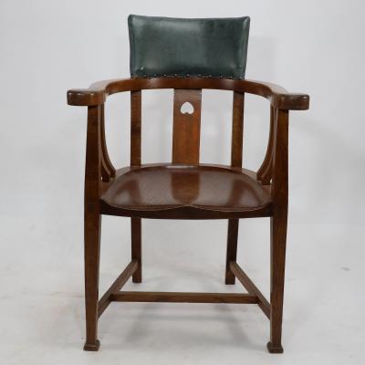 Ernest Archibald Taylor E A Taylor attributed An Arts Crafts Oak Tub Chair with a Pierced Heart