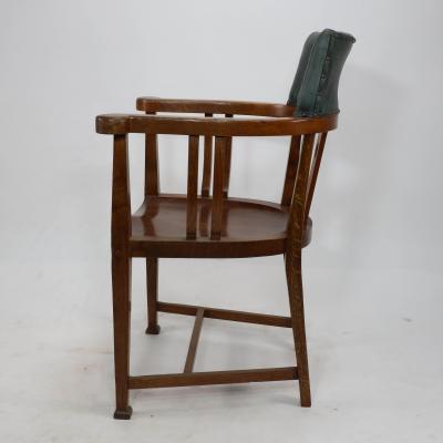 Ernest Archibald Taylor E A Taylor attributed An Arts Crafts Oak Tub Chair with a Pierced Heart