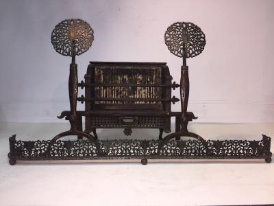 Ernest Gimson STYLIZED FOILIATE COTSWOLD SCHOOL ANDIRONS AND SURROUND