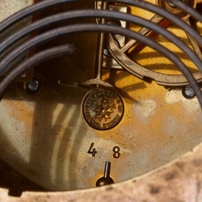 Ernest Royer Neoclassical mantel clock in ormolu and Sevres style porcelain by Ernest Royer