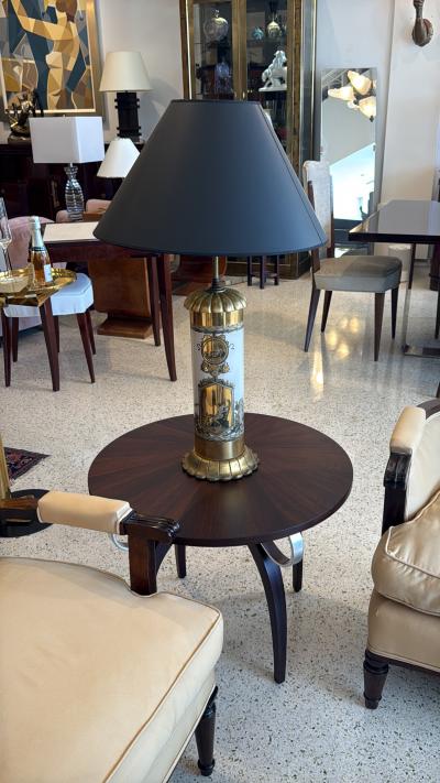 Eug ne Printz A pair of round Art Deco side tables in the style of Eug ne Printz