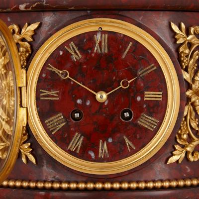 Eugene Aizelin Louis XVI style ormolu and rouge griotte marble clock set
