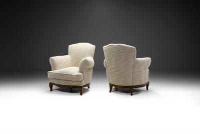 European Lounge Chairs with Sculpted Wooden Legs Europe ca 1950s