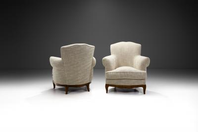 European Lounge Chairs with Sculpted Wooden Legs Europe ca 1950s