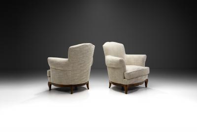European Lounge Chairs with Sculpted Wooden Legs Europe ca 1950s