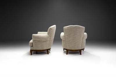 European Lounge Chairs with Sculpted Wooden Legs Europe ca 1950s