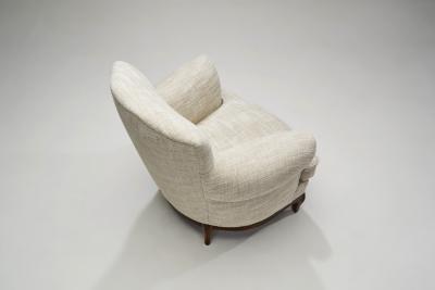 European Lounge Chairs with Sculpted Wooden Legs Europe ca 1950s